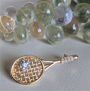 Vintage 1990 Novika gold tone tennis racket brooch pin with clear rhinestones