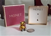Vintage Monet gold tone teddy bear brooch with red rhinestones and original box