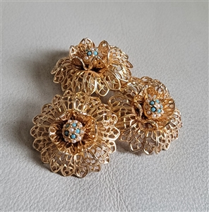 Vintage costume jewelry gold tone filigree floral brooch with blue and white beads