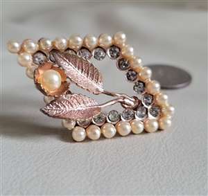 Vintage rose gold tone geometric floral brooch featuring clear glass beads and faux pearls