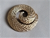 Vintage 1980s satin gold tone textured swirl wave circular brooch pin accessory