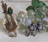 Vintage Ambassador gold tone roadrunner brooch and pave crystal finches on branch brooch set