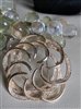 Authentic Sarah Coventry signed gold tone pin brooch with a shimmering textured geometric swirl design