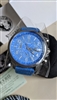 Watch Mens Versus by Versace Soho Blue Gunmetal Chronograph Box Set showing blue sunray dial yellow accents and canvas strap