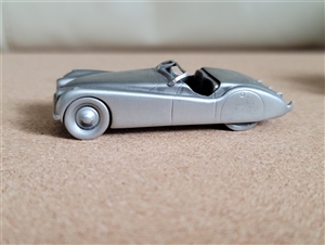 Vintage Danbury Mint solid pewter miniature 1949 Jaguar XK120 roadster car replica crafted in England bottom hallmark view Vintage Danbury Mint solid pewter miniature 1949 Jaguar XK120 roadster car replica crafted in England bottom hallmark view