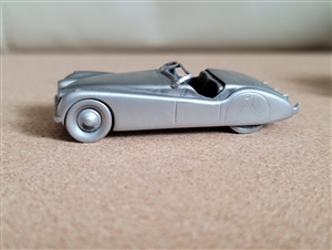 Vintage Danbury Mint solid pewter miniature 1949 Jaguar XK120 roadster car replica crafted in England bottom hallmark view