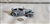 Vintage 1975 pewter 1930 Model A Roadster model car by Danbury Mint England showing authentic underside hallmark and open-top design details