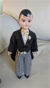 Sleepy eyes groom hard plastic doll moving hands