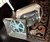 Cavalier De Luxe 8mm vintage movie projector with metal case and blue film reel