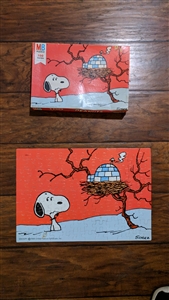 Vintage Peanuts jigsaw puzzle by Milton Bradley from nineteen fifty eight with one hundred and eight pieces in original box