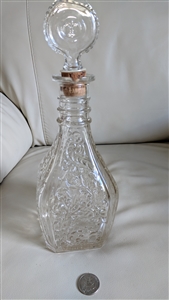 Vintage pressed glass decanter with leaves and vines design and fleur de lis stopper
