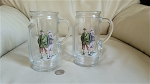 vintage set of two 1980 glass beer steins in shape of golf bags with two golfer decoupage marked canada barware in preowned condition