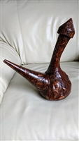 Vintage leather wrapped amber glass decanter embossed with Don Quixote and Sancho Panza