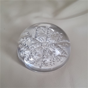 Heavy solid clear glass domed paperweight with a 3D frosted snowflake design on the base preowned Avon France