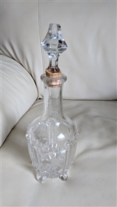 Antique four-footed etched glass decanter with star cut base and cork stopper