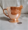 Preowned vintage Anchor Hocking Peach Lustre Laurel footed glass creamer