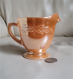 Preowned vintage Anchor Hocking Peach Lustre Laurel footed glass creamer