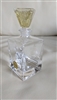 Vintage SC Line Italian lead crystal rectangular perfume bottle featuring a shimmering yellow glitter faceted stopper, gold foil maker sticker, and collectible vanity decor styling
