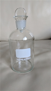 Vintage Wheaton clear glass apothecary bottle with stopper and number two mark on base