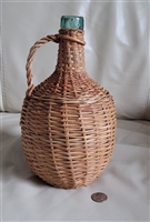 Vintage aqua green glass woven wicker basket wrapped decanter with handle