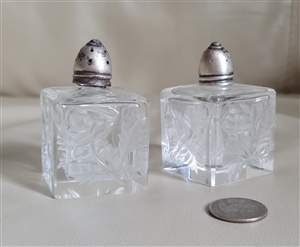 Set of two vintage square clear glass salt and pepper shakers with floral design and sterling silver lids