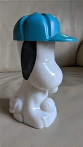 Vintage Snoopy Avon milk glass after shave bottle with a blue hat and black ears