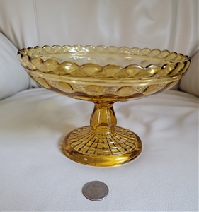 Vintage apple juice amber glass pedestal bowl with scalloped rim and thumbprint design