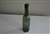 Vintage brown glass bottle with cork stopper for collectible storage and home decor