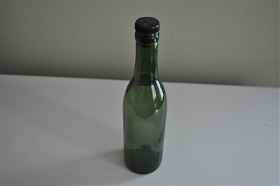 Vintage brown glass bottle with cork stopper for collectible storage and home decor