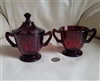Anchor Hocking Royal Ruby red glass two piece sugar bowl set featuring a lidded bowl and an open bowl from the 1950s