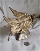 Vintage Brass Flying Angel single candle holder on an ornate base.