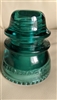 This preowned vintage green glass Hemingray 42 utility insulator features a classic bell shape and industrial design