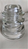 This preowned vintage clear glass Hemingray 46 utility insulator features a classic industrial design