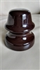 This preowned vintage brown ceramic utility insulator features a classic bell shape and industrial design
