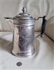 Antique silver plated metal teapot with ornate lid cover copper interior and carved wooden handle decorative display