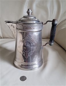 Antique silver plated metal teapot with ornate lid cover copper interior and carved wooden handle decorative display