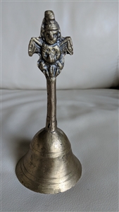 Antique hand forged brass bell featuring Hindu God Garuda winged deity