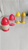 Two color sets of four vintage 1950s U.A. Kasin rocket-style salt and pepper shakers