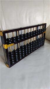 Vintage Lotus Flower Brand abacus with 91 beads and factory emblem on a wooden frame
