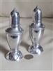 VIntage silver tone metal salt and pepper shakers set.