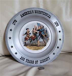 Bicentennial pewter plate with Spirit of Seventy Six porcelain center and stars
