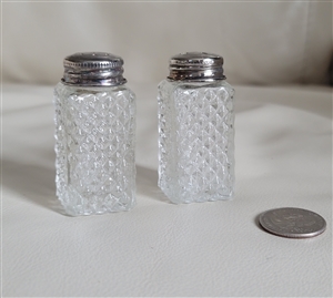 Pre-owned vintage diamond cut pressed glass salt and pepper shaker set for display or collection