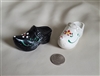 Vintage Dutch clogs metal salt and pepper shakers.