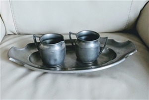 Manning Bowman Art Nouveau pewter serving tray with matching sugar bowl and creamer pitcher from the 1910s