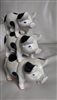 vintage cast iron stacked spotted pigs home decor