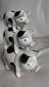 vintage cast iron stacked spotted pigs home decor
