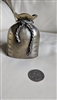 Metal vintage money sock in gold tone colors for home, office display.