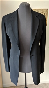 Vintage Donna Karan Signature jet black blazer jacket featuring one-button closure, front pockets, and tailored long fit