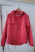 Red Levi Strauss & Co outdoor adventure women's hooded cycling jacket with reflective accents and back pocket