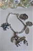 Vintage Italian sterling silver charm bracelet featuring ram and Oregon souvenirs